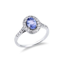 Anillo halo en oro blanco 18 quilates con tanzanita ovalada