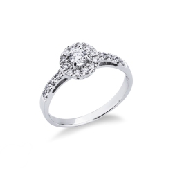 Solitario de oro blanco 18K con diamante central y laterales