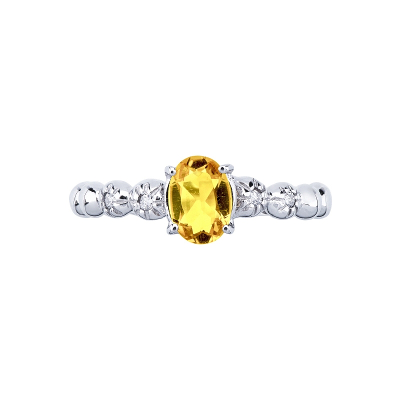 Anillo en oro blanco de 18 quilates con un citrino y 2 diamantes Anillo en oro blanco de 18 quilates con un citrino y 2 diamantes