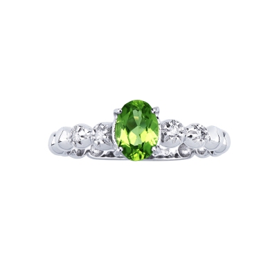 Anillo en oro blanco 18 quilates con un peridoto y 2 diamantes 