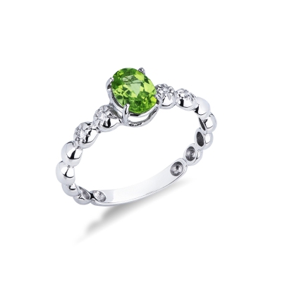 Anillo en oro blanco 18 quilates con un peridoto y 2 diamantes 