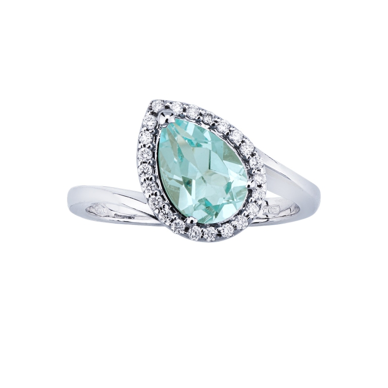Anillo halo en oro blanco 18 quilates con una aguamarina y diamantes Anillo halo en oro blanco 18 quilates con una aguamarina y diamantes