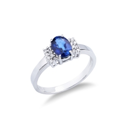 Anillo en oro blanco de 18k con zafiro azul y diamantes