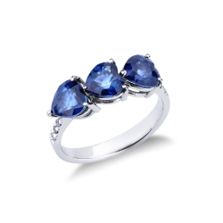 Anillo en oro blanco de 18k con zafiro azul
