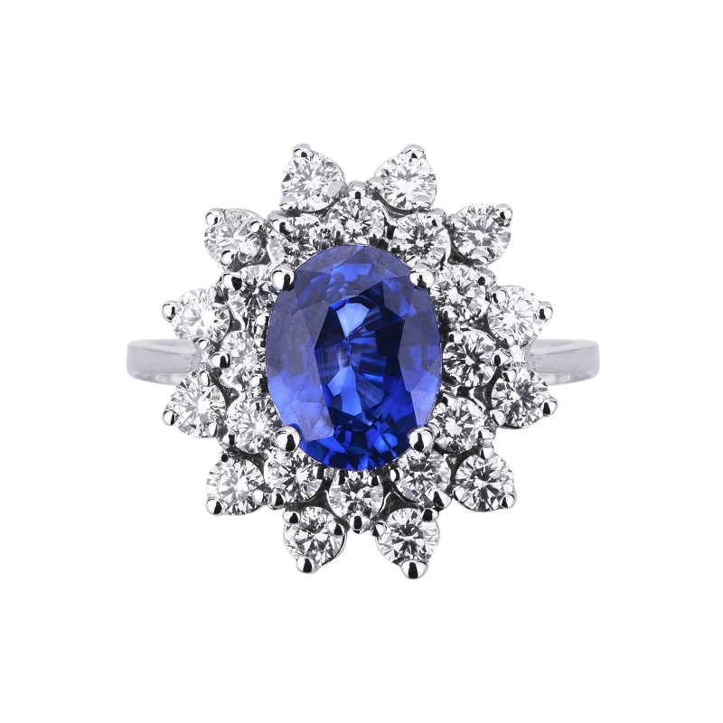Anillo de doble halo en oro blanco de 18 quilates con zafiro azul Anillo de doble halo en oro blanco de 18 quilates con zafiro azul