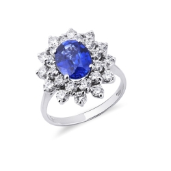 Anillo de doble halo en oro blanco de 18 quilates con zafiro azul