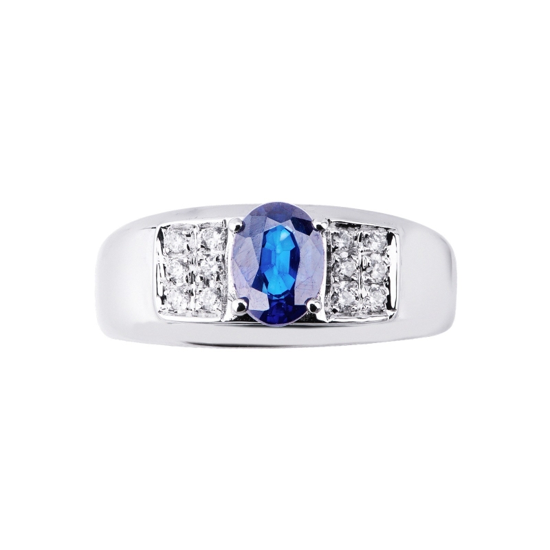 Anillo en oro blanco 18k con zafiro azul ovalado y diamantes Anillo en oro blanco 18k con zafiro azul ovalado y diamantes