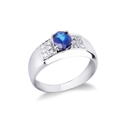 Anillo en oro blanco 18k con zafiro azul ovalado y diamantes