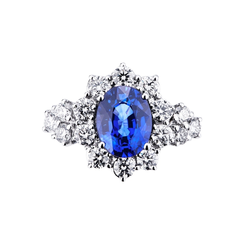 Anillo de mujer en oro blanco de 18k con zafiro azul Anillo de mujer en oro blanco de 18k con zafiro azul