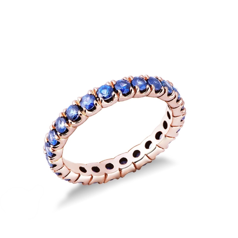Anillo Eternity en oro rosa 18k con zafiros azules