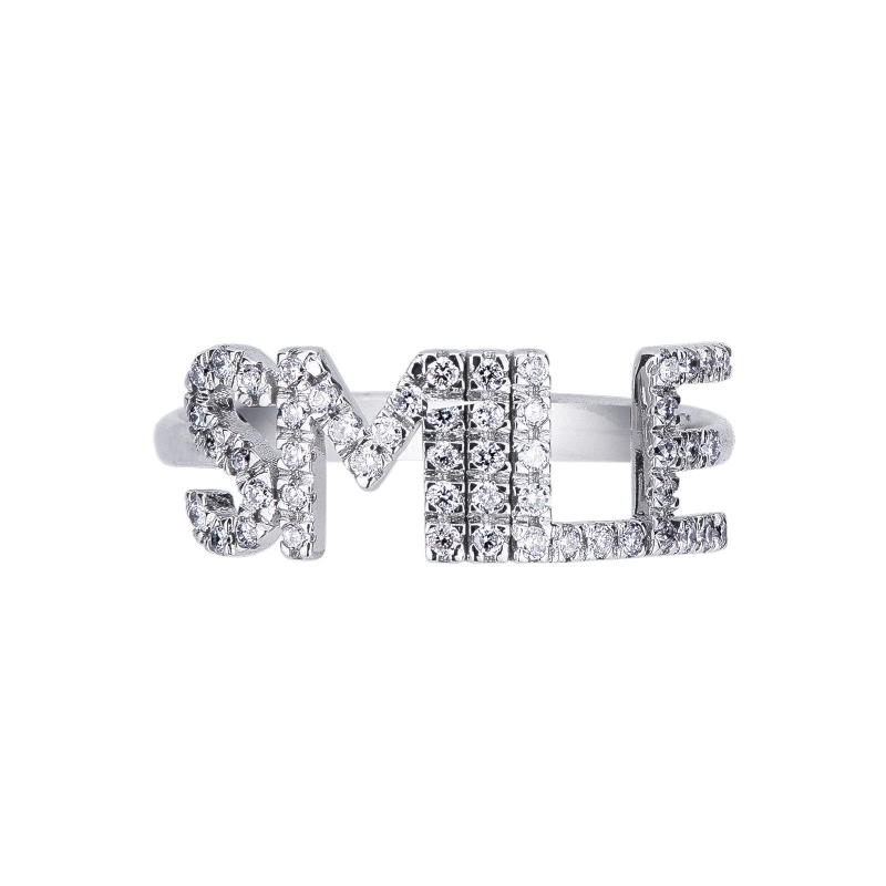 Anillo con letras SMILE en oro blanco y diamantes Anillo con letras SMILE en oro blanco y diamantes