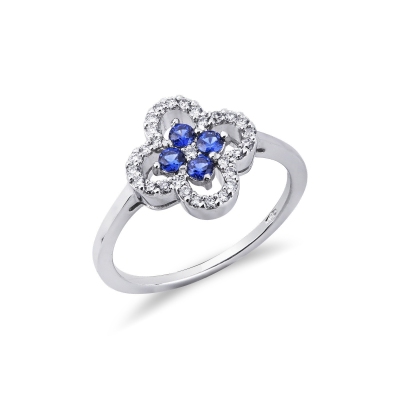 Anillo en oro blanco de 18k en forma de flor con zafiros azules