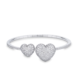 Brazalete en oro blanco 18k con dos corazones de diamantes
