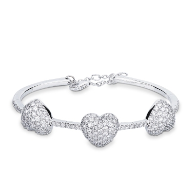 Pulsera de oro blanco y diamantes con tres corazones