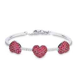 Brazalete en oro blanco 18k con 3 corazones en rubíes y diamantes