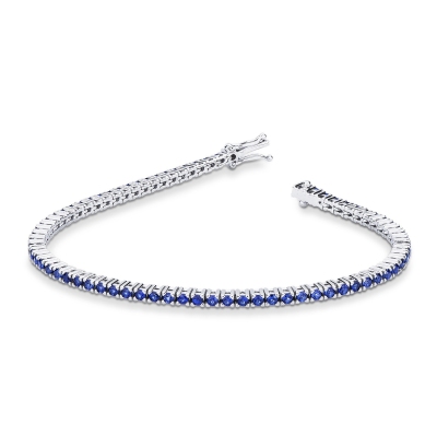 Pulsera riviera en oro blanco de 18k con zafiros azules