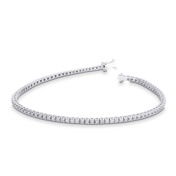 Brazalete tenis con garras en oro blanco 18k con diamantes