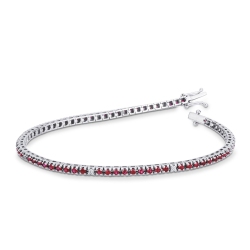 Pulsera tenis a garra en oro blanco 18k con rubíes y diamantes