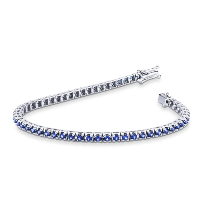 Pulsera Tennis piramidal en oro blanco 18 quilates con zafiros azules