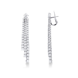 Pendientes riviere de tres hileras en oro blanco y diamantes