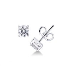 Pendientes botón solitarios oro blanco y diamantes 0.80 quilates