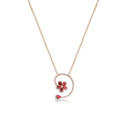 Collar en oro rosa de 18k con flor de rubíes