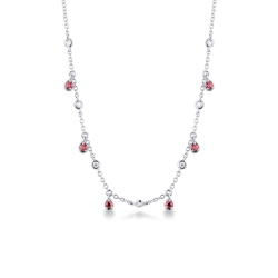 Collar en oro blanco de 18 quilates con colgantes en forma de gota con rubíes y diamantes