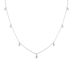Collar en oro blanco 18k con nueve colgantes en forma de gota e incrustaciones de diamantes