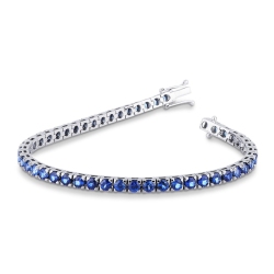 Pulsera tenis de oro blanco de 18 quilates con zafiro azul