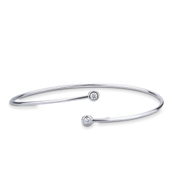 Pulsera rígida y abierta de oro blanco 18k y diamantes 