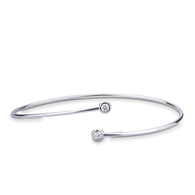 Pulsera rígida y abierta de oro blanco 18k y diamantes 