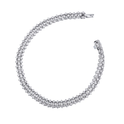 Pulsera diseño tejido oro blanco 18k engastada con diamantes