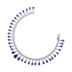 Brazalete fantasia en oro blanco 750 con zafiros azules y diamantes