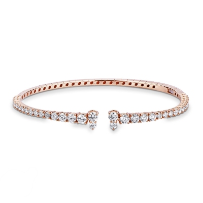 Pulsera rígida en oro rosa 18k con diamantes 