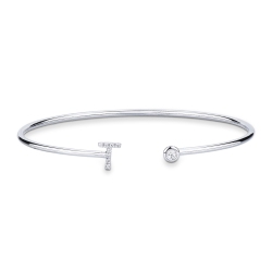 Pulsera rigida de oro con letra T en diamantes