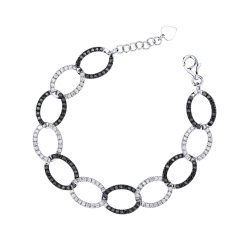 Pulsera en oro blanco 18K con diamantes negros y blancos