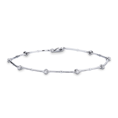 Pulsera tenis alternada oro blanco de 18 quilates con diamantes
