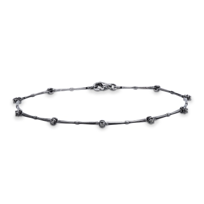 Pulsera alternada oro bruñido 18 quilates diamantes negros