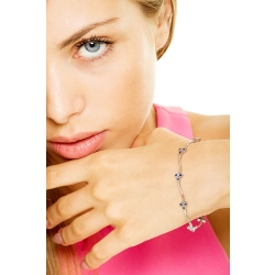 Pulsera semirrígida en oro blanco de 18k con flores y zafiros azules 2
