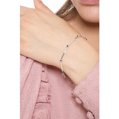 Pulsera alternada oro blanco de 18 quilates con zafiros azules