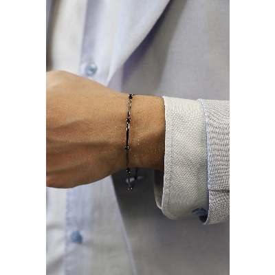 Pulsera hombre oro18 quilates completamente bruñido con diamantes negros