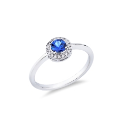 Anillo de oro blanco de 18 quilates con un zafiro azul