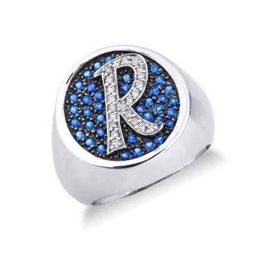Anillo pavé en oro blanco de 18 quilates con diamantes y zafiros azules