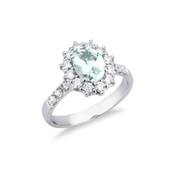 Anillo en oro blanco de 18k con aquamarina ovalada y halo diamantes