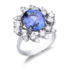 Anillo en oro blanco de 18k con tanzanita ovalada y diamantes