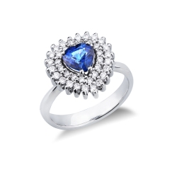 Anillo halo en oro blanco de 18k con un zafiro en forma de corazón