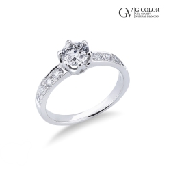 Anillo solitario en oro blanco 18 k con piedra central de 0,90 ct