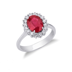 Anillo en oro blanco 750 con rubí ovalado y contorno de diamantes