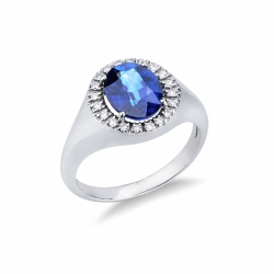 Sello oro blanco 18k con zafiro azul ovalado y diamantes