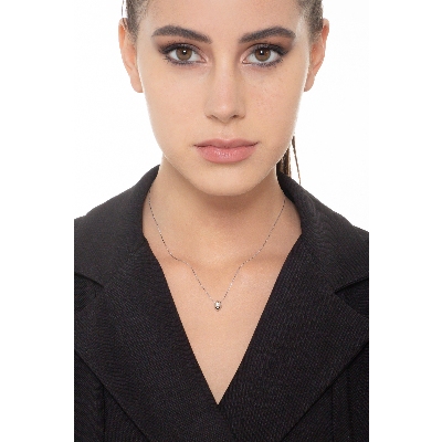 Collar de oro blanco 18k y diamante 0.06 quilates en forma de grano de arroz